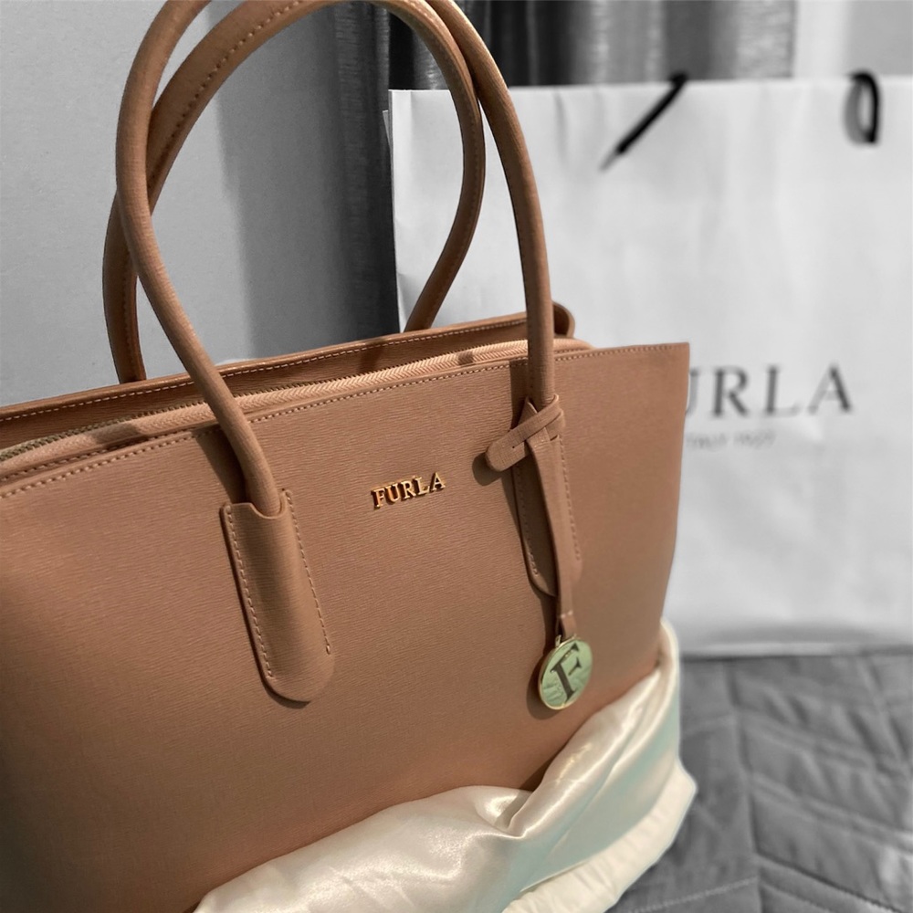 Furla bag, neutral color. Was a gift, never got to use. Opened for pictures.